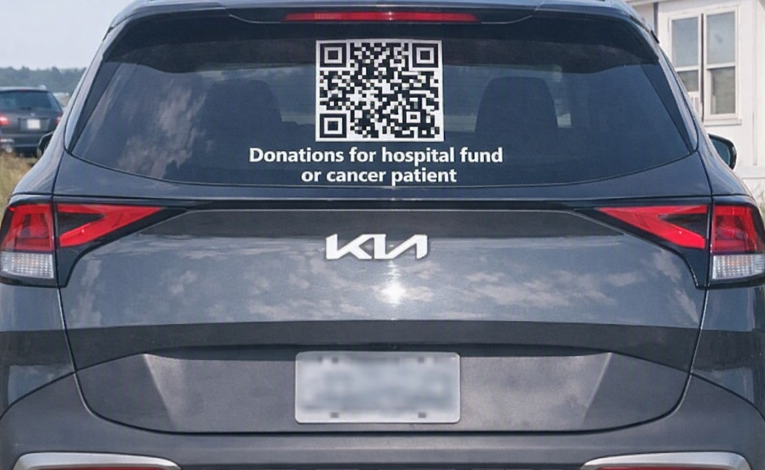 Hospital-fund decal on the family car — everyone stuck in traffic behind you can help.